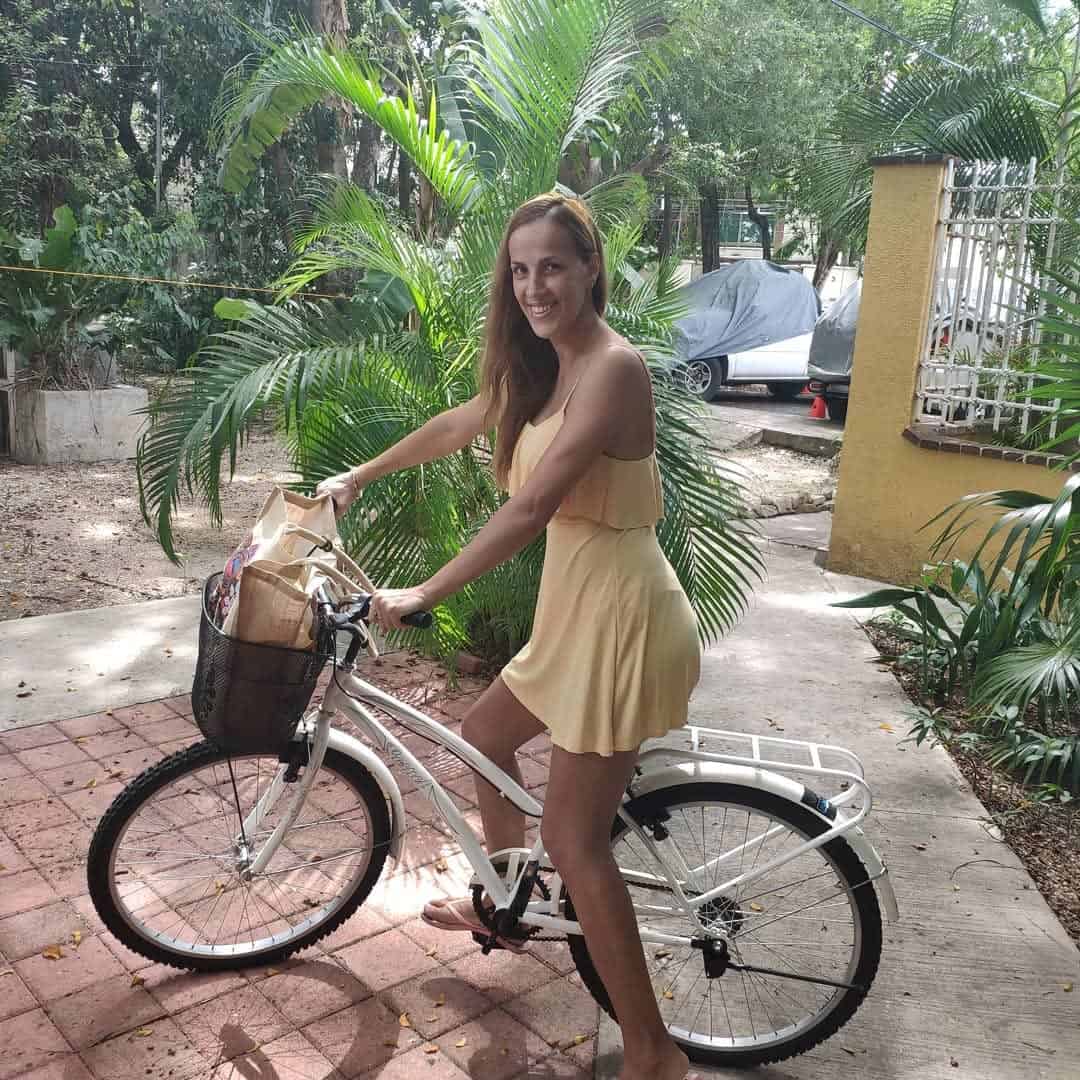 Bike rental Playa del Carmen: woman riding a Playa Bike Rentals beach cruiser